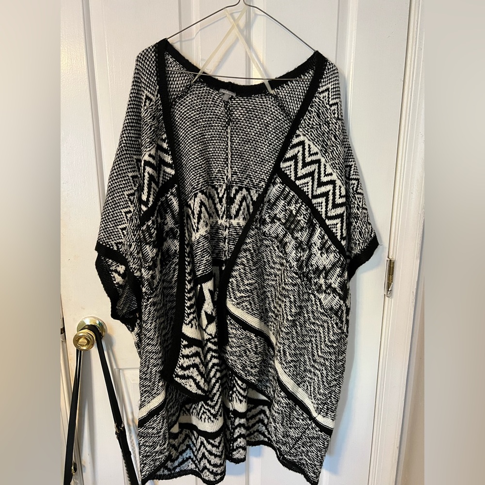 I am selling a black and white wool cardigan